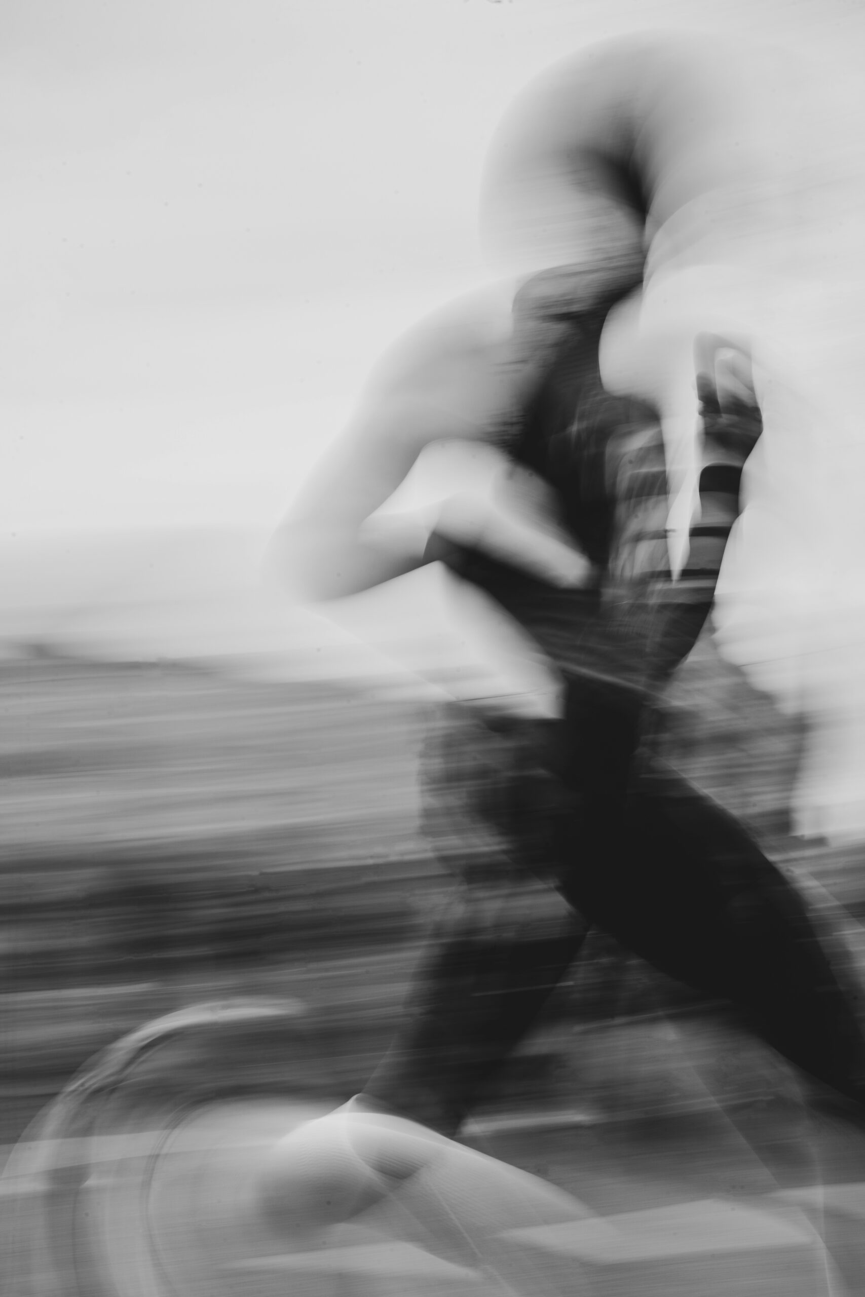 Runner running in black and white with artsy blur