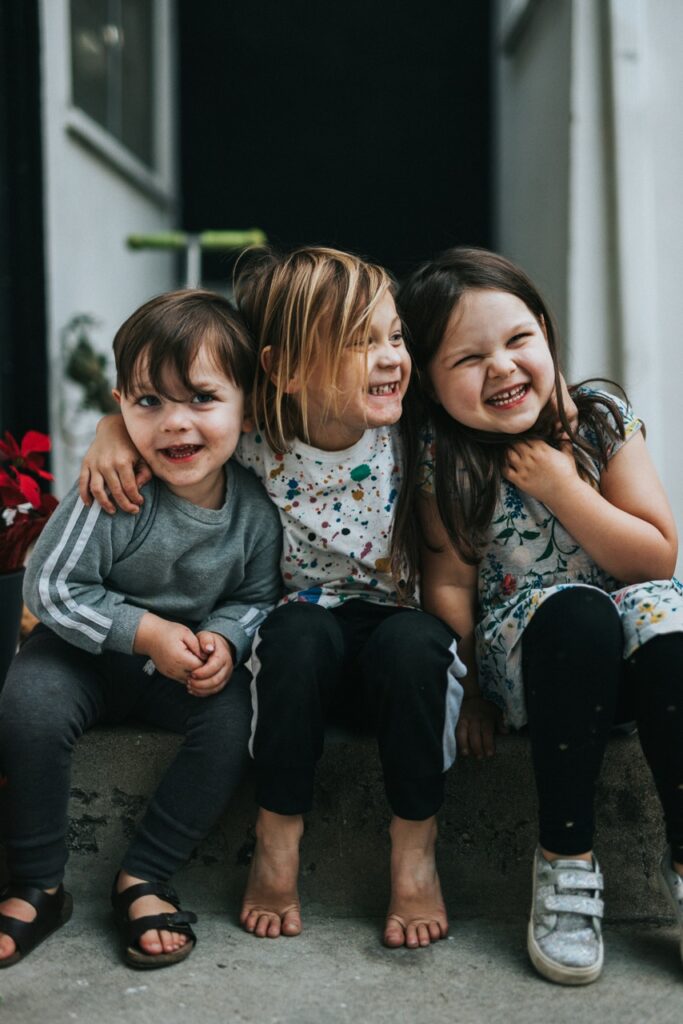 kids hugging and laughing